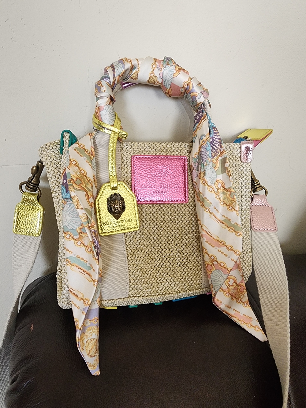Kurt Geiger Straw Tote with Pink Logo Patch and Gold Tag